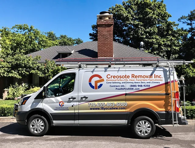 Brunswick Chimney Sweep technician removing creosote safely in Brunswick, GA